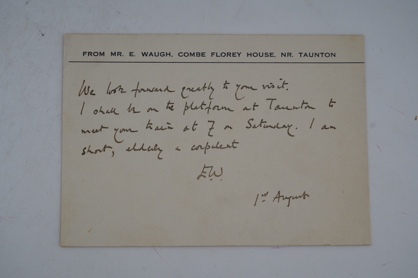 Evelyn Waugh (1903-1966), English Writer and Novelist. A.L.S., with his initials E.W., on one side of his personal printed correspondence card, Combe Florey House, near Taunton, 1st August n.y. (1963), to John Stathatos.